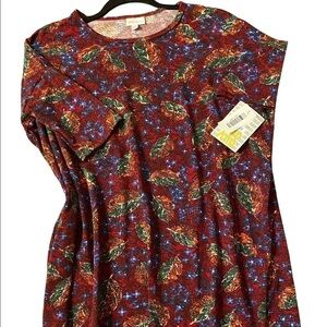NWT LuLaRoe Irma top a loose, knit "high-low" tunic w/
fitted mid-length sleeves